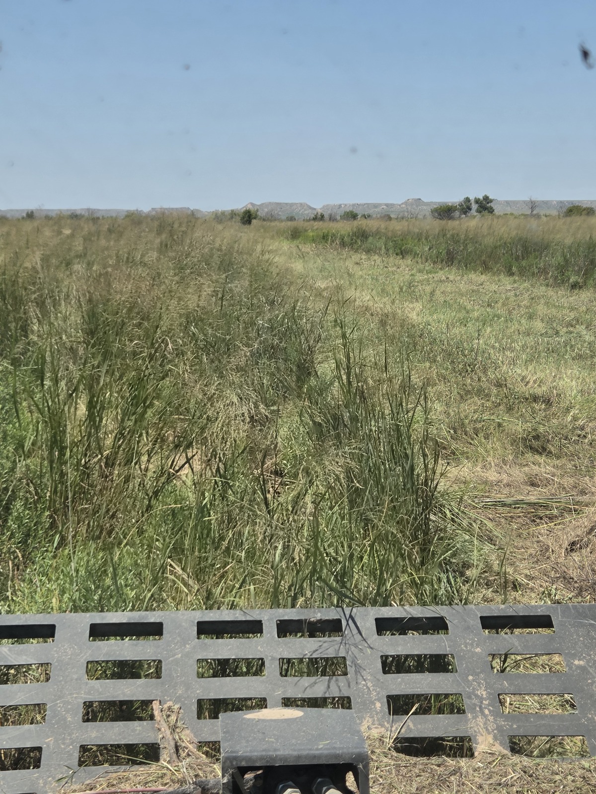 Heavy grass and brush clearing for wildfire fuel load reduction in the Texas Panhandle