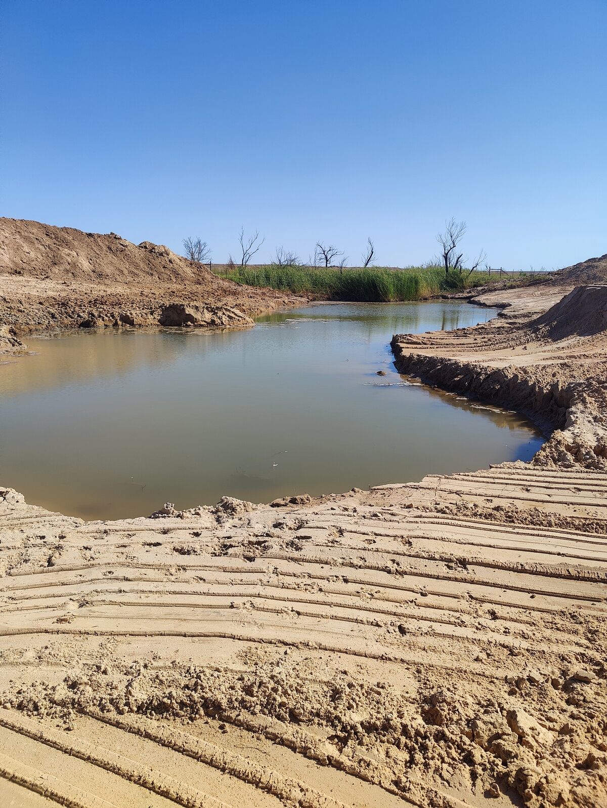 Livestock tank construction site on Texas Panhandle ranch